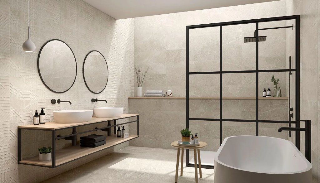 Baño con doble lavabo, mamparas y ducha efecto lluvia